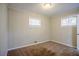 Bedroom with wood paneled walls and carpet at 3743 Turner Heights Dr, Decatur, GA 30032
