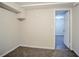Bright and airy bedroom with carpet flooring and access to another room at 3743 Turner Heights Dr, Decatur, GA 30032