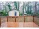 Wooden deck overlooking backyard with shed and trees at 3743 Turner Heights Dr, Decatur, GA 30032