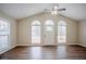 Spacious living room with hardwood floors and large windows at 3743 Turner Heights Dr, Decatur, GA 30032