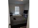 Functional bedroom with two beds, window, and plenty of storage space at 2502 Polaris Sw Way, Atlanta, GA 30331
