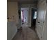 Upstairs hallway showcasing a neutral-toned carpet and doors leading to bedrooms at 2502 Polaris Sw Way, Atlanta, GA 30331