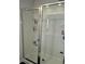 Modern bathroom shower stall with sliding glass door and built in shelving at 2502 Polaris Sw Way, Atlanta, GA 30331
