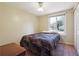 This bedroom has a bed, window to let the natural light in, and large closet at 190 Hembree Forest Cir, Roswell, GA 30076