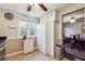 Charming kitchen nook with bright window, and a convenient view into the adjacent dining room at 190 Hembree Forest Cir, Roswell, GA 30076