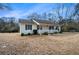 Charming single-story home with a spacious yard, and a white picket fence at 4807 Highway 212, Covington, GA 30016