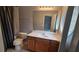 Bathroom featuring a modern vanity, framed mirror, toilet, and shower at 2025 Austin Park Cir, Decatur, GA 30032
