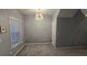 Empty bedroom features modern light fixture and neutral paint at 2025 Austin Park Cir, Decatur, GA 30032