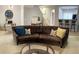 Living room with a curved sofa and neutral color scheme at 2025 Austin Park Cir, Decatur, GA 30032