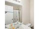 Bathroom featuring a white vanity, a tub-shower, and modern fixtures at 65 Bridge Dr, Douglasville, GA 30134