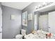 Cozy bathroom featuring gray walls, a tub-shower, and a vanity at 65 Bridge Dr, Douglasville, GA 30134
