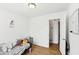 Neutral bedroom featuring hardwood floors and a charming wall art print at 65 Bridge Dr, Douglasville, GA 30134