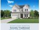 Two-story house with white and gray exterior, and a three-car garage at 733 Keystone Dr, Woodstock, GA 30188