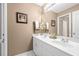 Clean bathroom with double sinks and white cabinets at 140 Lost Forest Dr, Mcdonough, GA 30252