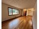 Open living room and dining area with hardwood floors at 2926 Monterey Dr, Decatur, GA 30032