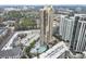 Gorgeous aerial view of the high-rise condominium building, pool, and city at 3481 Ne Lakeside Dr # 1508, Atlanta, GA 30326
