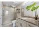 Bright bathroom featuring granite counters, tiled walk-in shower and modern fixtures at 3481 Ne Lakeside Dr # 1508, Atlanta, GA 30326