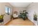 Cozy bedroom featuring a woven chair, natural light, and closet storage at 3481 Ne Lakeside Dr # 1508, Atlanta, GA 30326