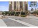 Stunning high rise exterior with manicured landscaping and gated entrance at 3481 Ne Lakeside Dr # 1508, Atlanta, GA 30326