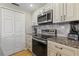 Kitchen featuring stainless steel appliances and granite countertops at 3481 Ne Lakeside Dr # 1508, Atlanta, GA 30326