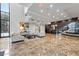 Spacious lobby with marble floors, lots of seating, and paneled accent wall at 3481 Ne Lakeside Dr # 1508, Atlanta, GA 30326