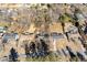 Aerial view of homes on a tree-lined street, some with pools at 260 Alpine Dr, Roswell, GA 30075