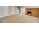 Finished basement featuring a brick fireplace and carpet at 3614 Main Station Sw Dr, Marietta, GA 30008
