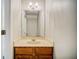 Simple bathroom with a single sink vanity and mirror at 3614 Main Station Sw Dr, Marietta, GA 30008