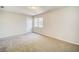 Large bedroom with a window and neutral decor at 3614 Main Station Sw Dr, Marietta, GA 30008