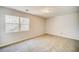 Spacious bedroom with neutral walls and carpet at 3614 Main Station Sw Dr, Marietta, GA 30008