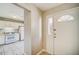 View of kitchen from entryway with tiled floor at 3614 Main Station Sw Dr, Marietta, GA 30008