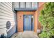 Blue front door entry to brick townhouse at 3614 Main Station Sw Dr, Marietta, GA 30008