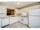 Bright eat-in kitchen, white cabinets, and tile flooring at 3614 Main Station Sw Dr, Marietta, GA 30008