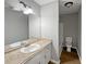 Bathroom with single vanity and shower/tub combo at 165 Riverbend Dr, Covington, GA 30014