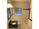 Clean bathroom with white tile and bathtub at 1970 Wells Sw Dr, Atlanta, GA 30311