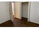 Bedroom with hardwood floors and closet at 1970 Wells Sw Dr, Atlanta, GA 30311