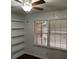 Bedroom with built-in shelves and hardwood floors at 1970 Wells Sw Dr, Atlanta, GA 30311