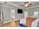 Main bedroom with ensuite bathroom access and hardwood floors at 2652 Tilson Rd, Decatur, GA 30032