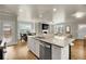 Open kitchen with island, granite countertops, and stainless steel appliances at 2652 Tilson Rd, Decatur, GA 30032