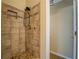 Large tiled shower with dual shower heads at 4650 Atlanta Hwy, Rutledge, GA 30663