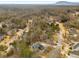 Panoramic aerial view of a tranquil community, filled with mature trees and beautiful homes at 2290 Spencers Way, Stone Mountain, GA 30087