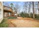 Spacious backyard with wooden deck and stairs at 2290 Spencers Way, Stone Mountain, GA 30087