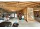 Spacious unfinished basement area with wooden framing, concrete floor, and visible overhead beams at 2290 Spencers Way, Stone Mountain, GA 30087