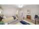 This bedroom has carpet and two twin beds and a view of the door to the ensuite bathroom at 2290 Spencers Way, Stone Mountain, GA 30087