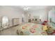 This bedroom has neutral walls, carpet and an antique dresser at 2290 Spencers Way, Stone Mountain, GA 30087