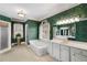A luxurious main bathroom with a soaking tub, walk-in shower, and a spacious vanity with ample counter space at 2290 Spencers Way, Stone Mountain, GA 30087