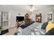 Spacious main bedroom with white trim, neutral colored walls, and a ceiling fan at 2290 Spencers Way, Stone Mountain, GA 30087