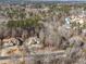 Aerial view of two houses situated on a wooded lot at 2311 Shoreline Pkwy, Villa Rica, GA 30180