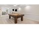 Basement game room with pool table and ample space at 2311 Shoreline Pkwy, Villa Rica, GA 30180