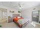 Spacious basement bedroom with a ceiling fan and full-size bed at 2311 Shoreline Pkwy, Villa Rica, GA 30180